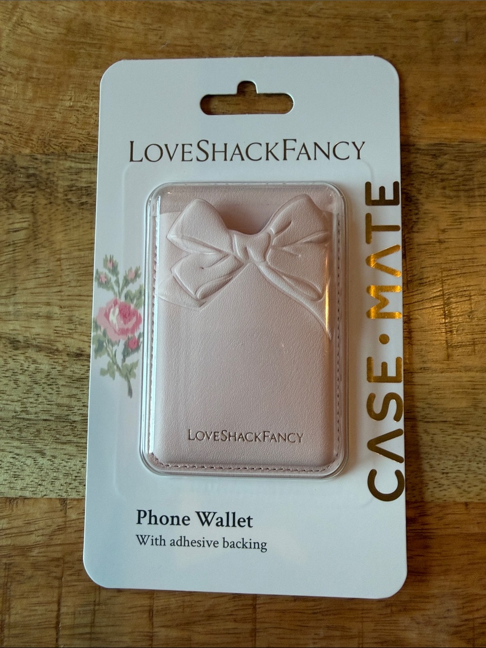 LoveShackFancy Blush Pink Phone Wallet with Embossed Bow